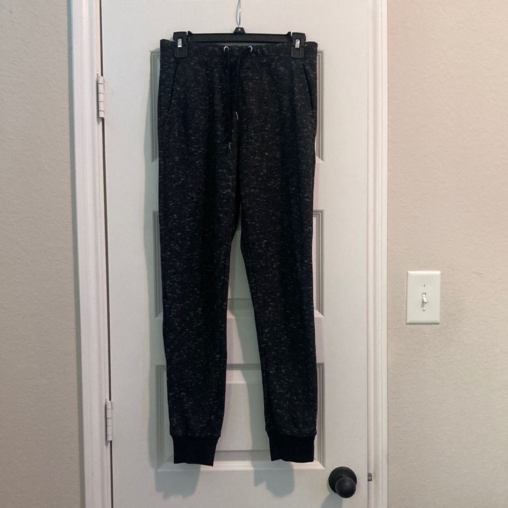 Game time boys black sweatpants with white speckles in a large